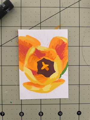 The tulip drawing in process, with the background still white and slightly less detail in the petals. The lack of contrast makes the shape less distinct.